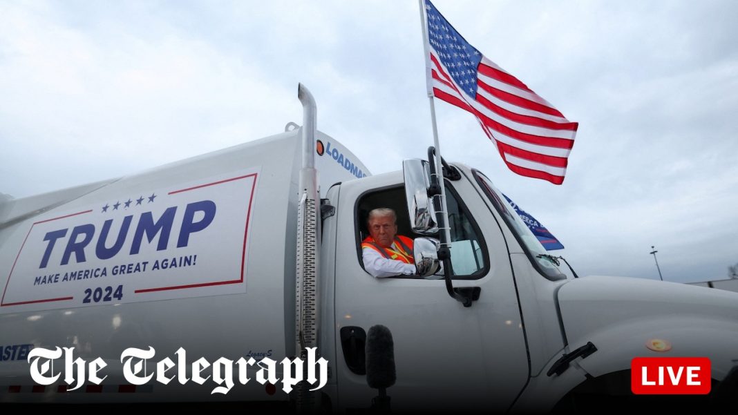 Donald Trump arrives in garbage truck to mock Joe Biden